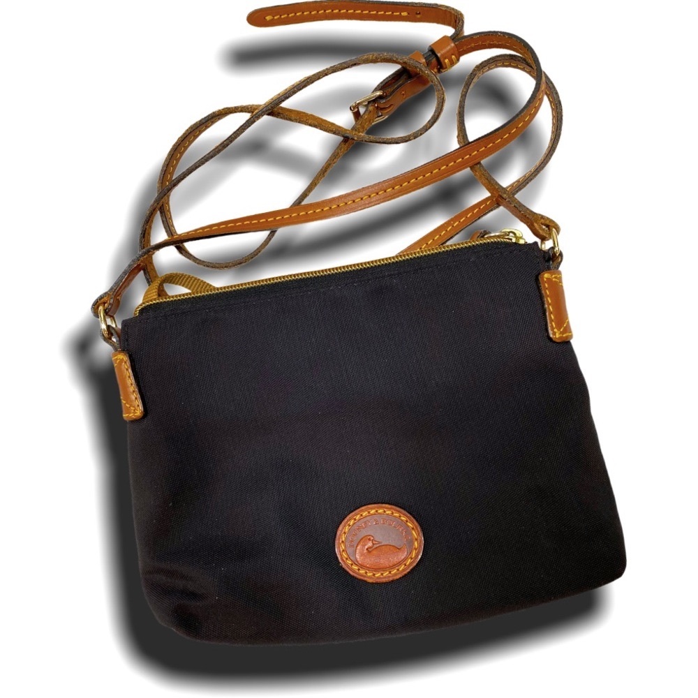 Dooney & Bourke canvas crossbody bag black leather straps classic styling midi